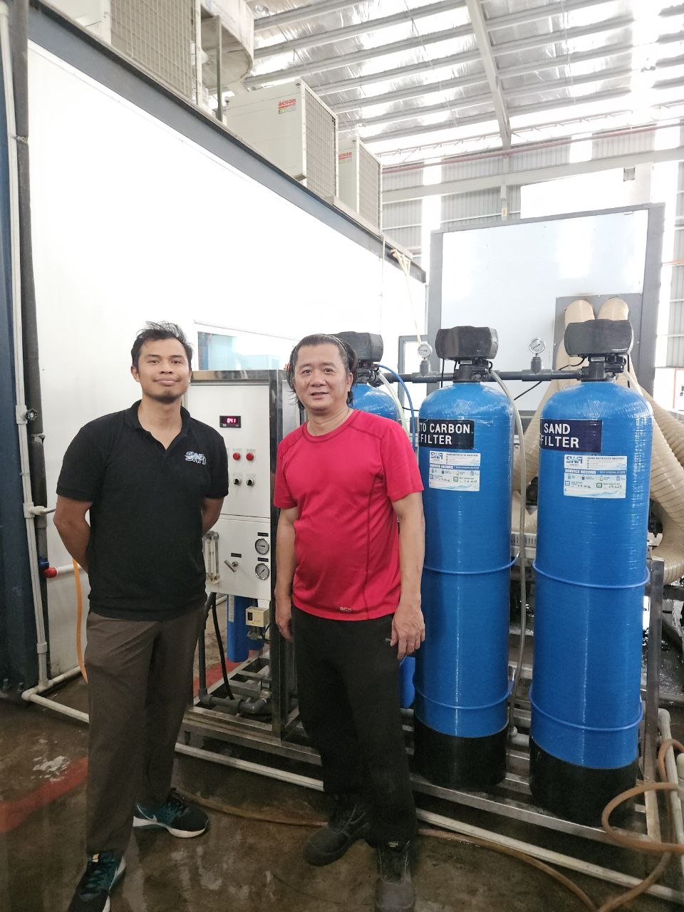 SWFI and client team at Nam Heng RO system